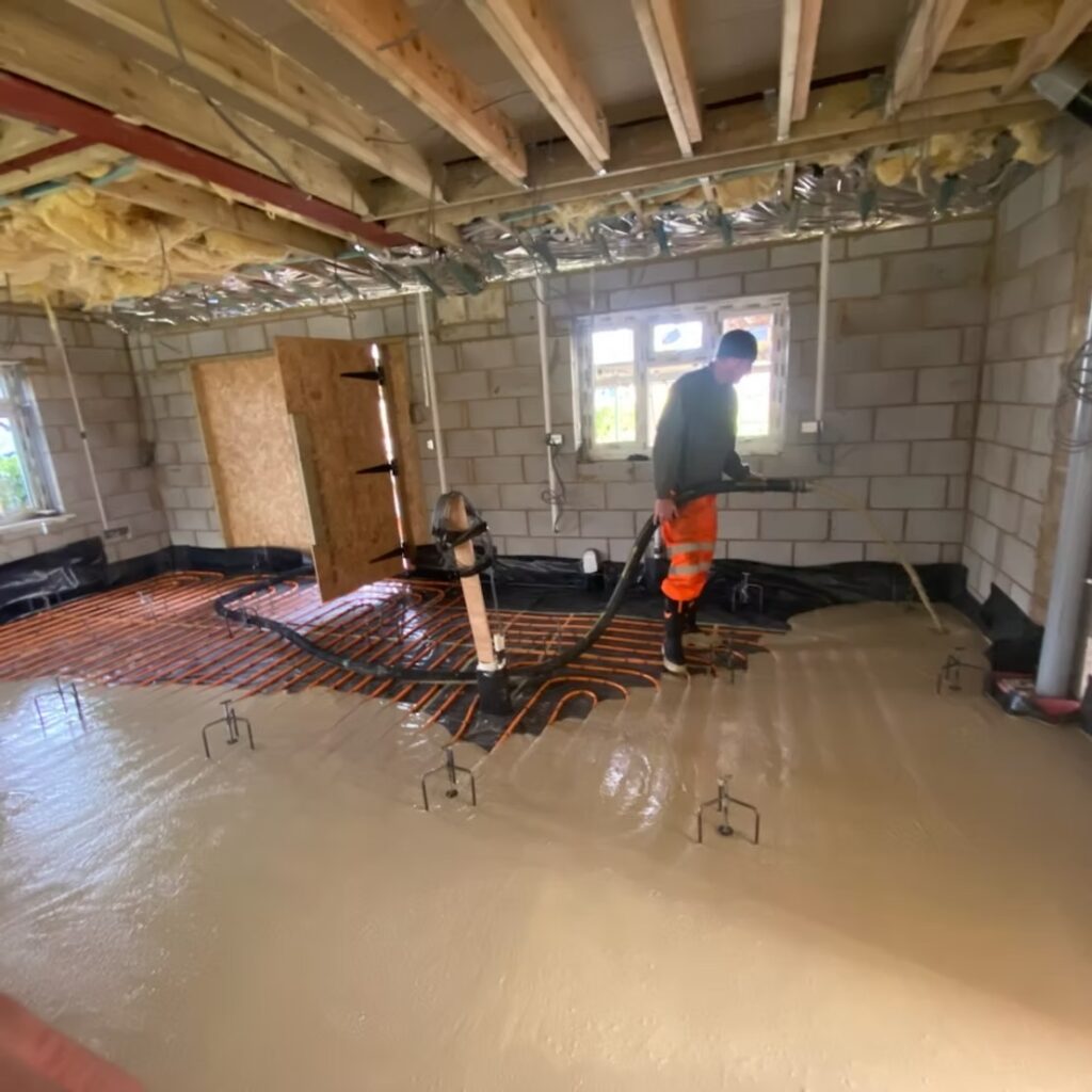 Self-levelling floor screed application by professional builders Lymington.