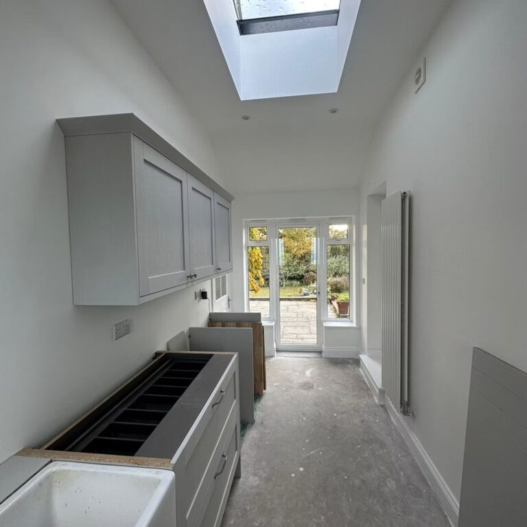 Narrow utility room installation with roof lantern by house extensions Southampton.