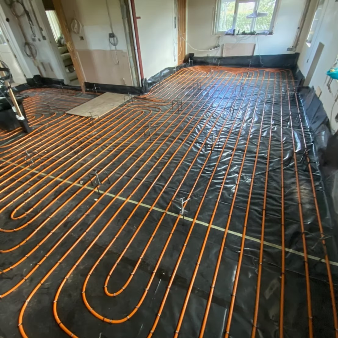 Underfloor heating manifold and pipe installation by professional builders Southampton.